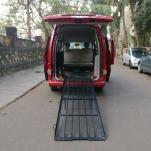 Image shows a Wheelchair Accessible Vehicle fitted with a ramp for wheelchair entry and exit.