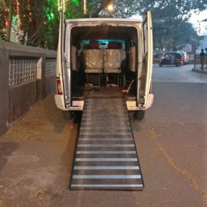 Image shows a wheelchair accessible van fitted with a ramp. Vehicle can be used as a wheelchair patient ambulance, or a wheelchair taxi