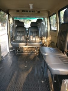 Image shows the internal view of a wheelchair accessible vehicle from the outside